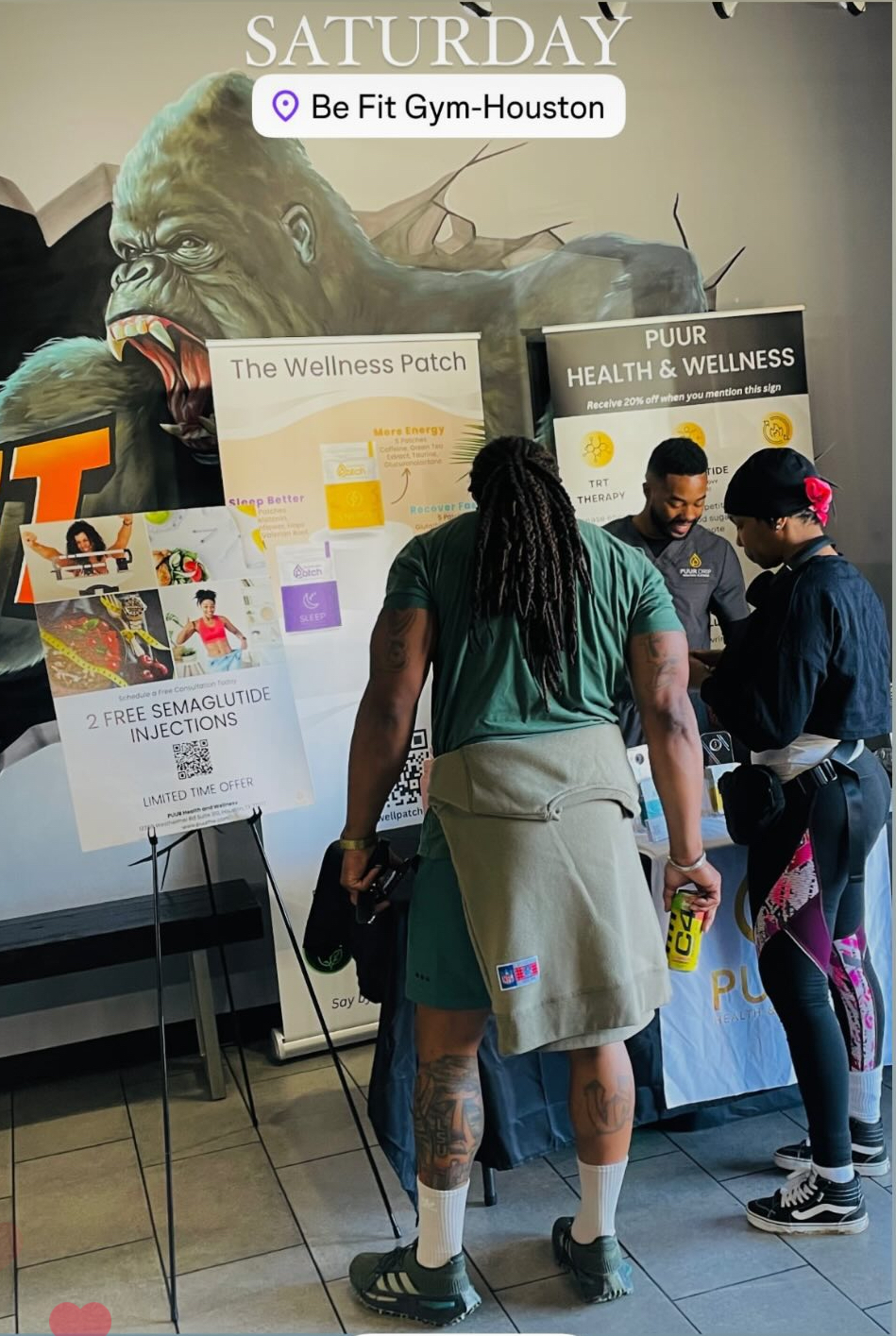 Trevin Tucker representing PUUR Health and Wellness at a community event in Houston